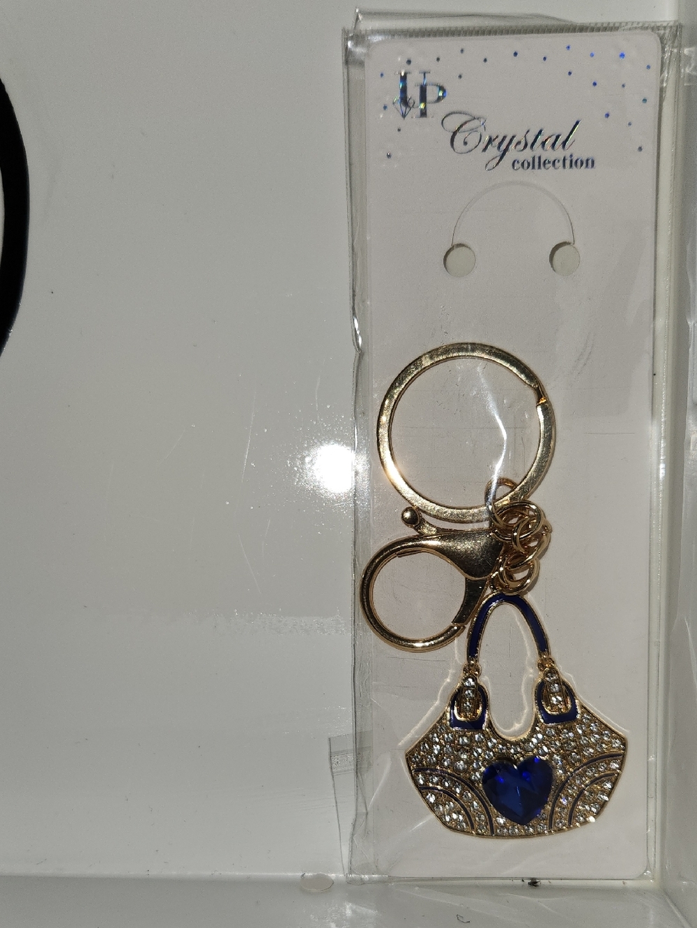 Gold-Tone Keychain with Blue Heart Accent